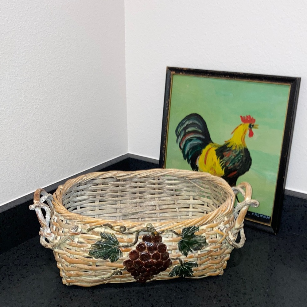 Rectangular basket with handles and grapevine decor